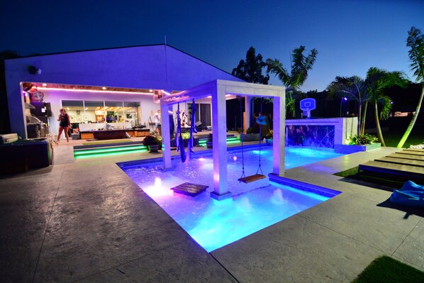 Outdoor pool, a heated pool - Lakefront Luxury pool 3100sq ft on lake. (Orlando)