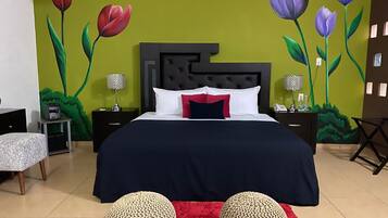 Deluxe Double Room | Living room | 32-inch TV with satellite channels