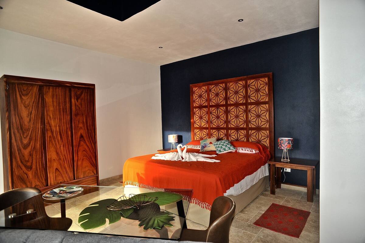 Premium bedding, laptop workspace, blackout curtains, iron/ironing board