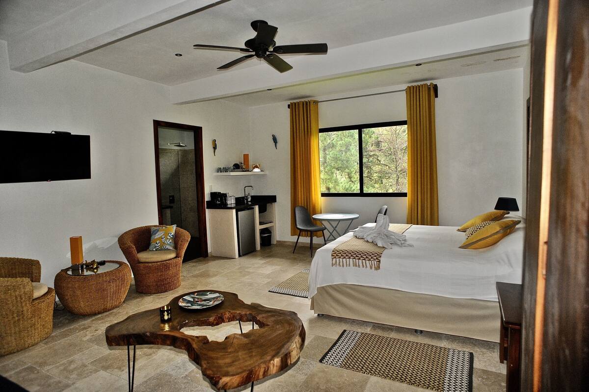 Premium bedding, laptop workspace, blackout curtains, iron/ironing board