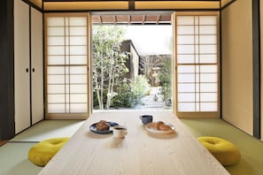 Kyo no Ondokoro MARUTAMACHI | Living area | 20-inch flat-screen TV with cable channels, LCD TV, heated floors
