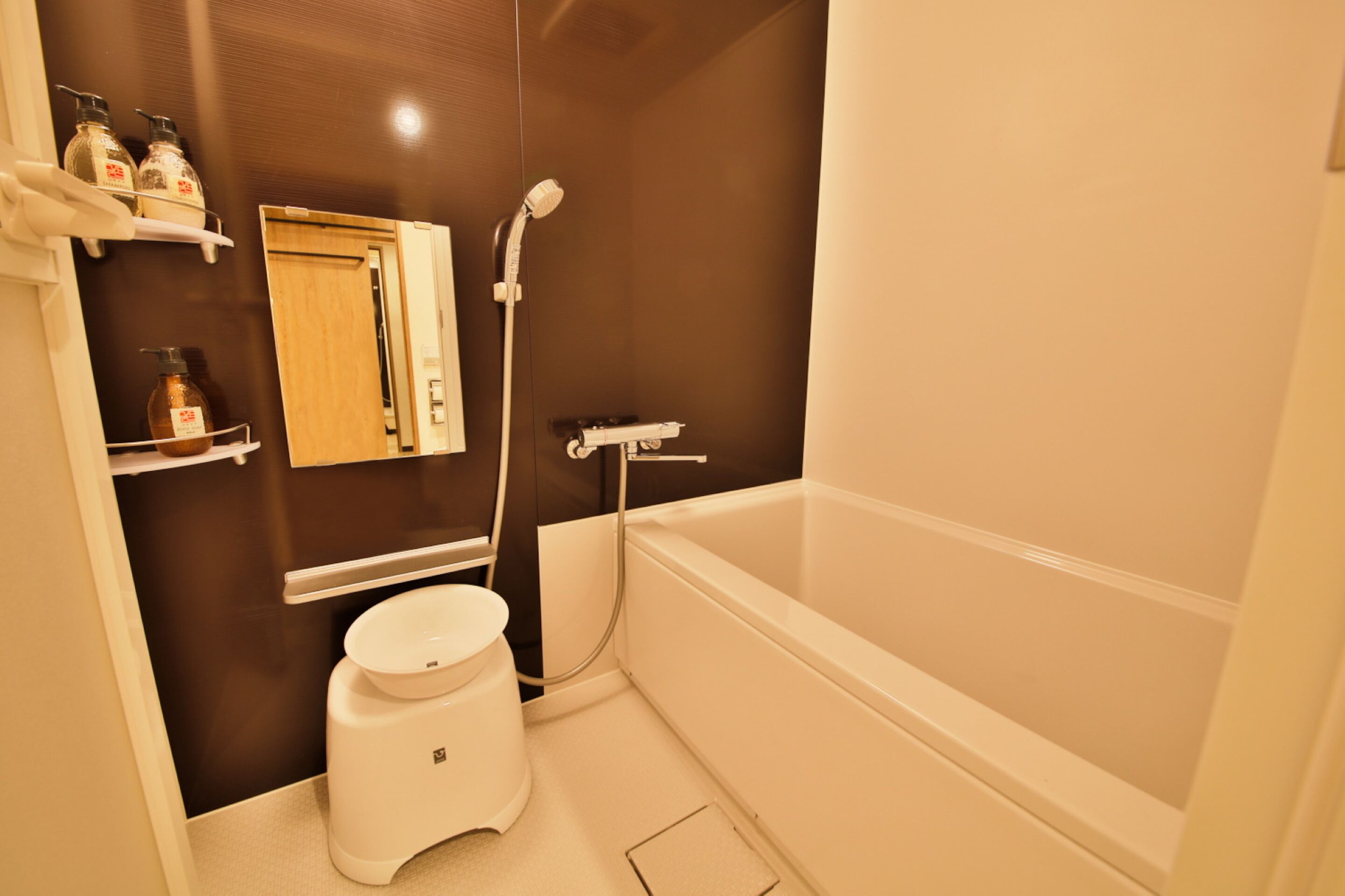 combined shower/bathtub, hair dryer, slippers, electronic bidet