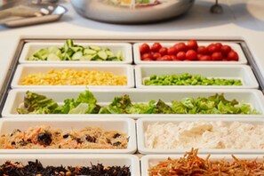A buffet with various food items including salads, fruits, and rice dishes. - Rembrandt Style Honatsugi (Atsugi)