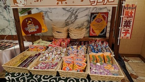 A display of various packaged snacks and sweets in a store. - Hotel Zips - Adults Only (Kawaguchi)