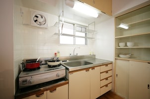 Fridge, microwave, stovetop, cookware/dishes/utensils
