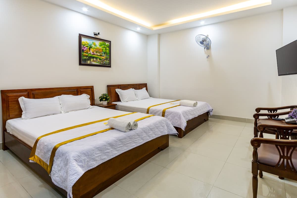 Habitación cuádruple Deluxe | Minibar, insonorización y wifi gratis