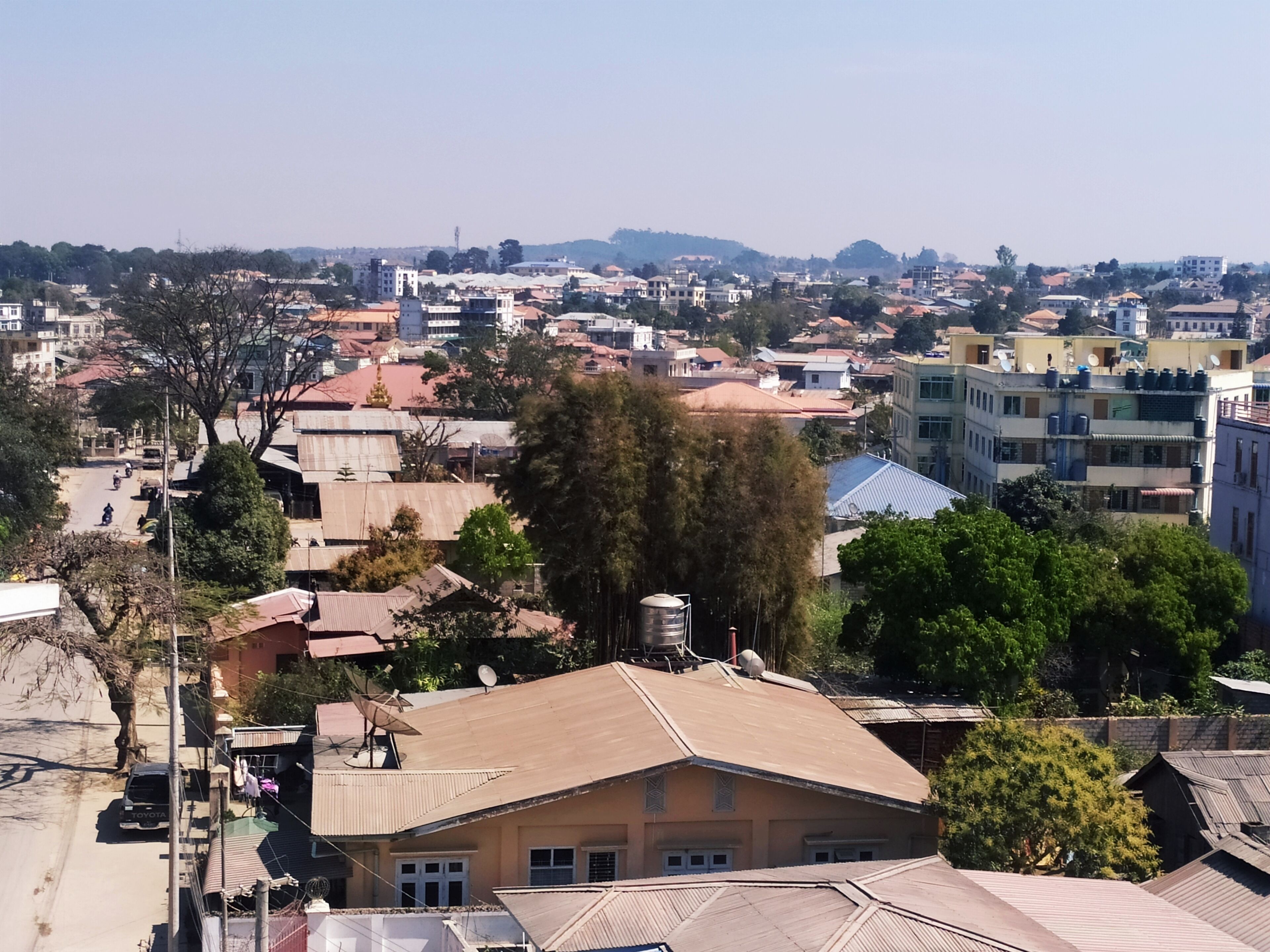 A residential area with various buildings, including houses and apartment complexes.