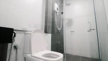 Shower, hair dryer, slippers, towels