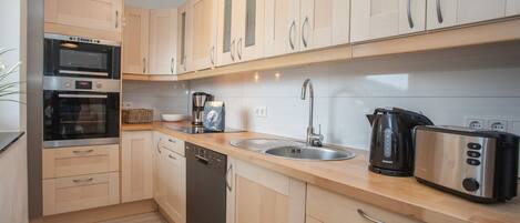 Fridge, microwave, dishwasher, coffee/tea maker