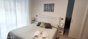 Premium bedding, down comforters, soundproofing, iron/ironing board