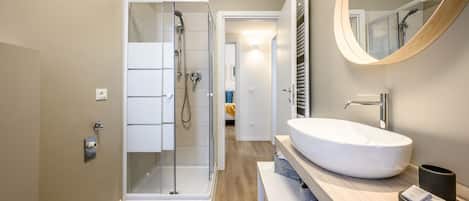 Apartment, 1 Bedroom | Bathroom | Shower, free toiletries, hair dryer, slippers