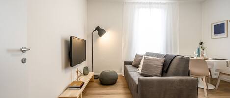 Apartment, 1 Bedroom | Living area | 49-inch Smart TV with digital channels, TV, Netflix