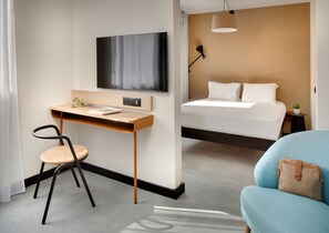 Superior Studio | Living area | 43-inch flat-screen TV with satellite channels, foosball, books