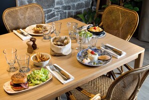 Lunch and dinner served, local cuisine