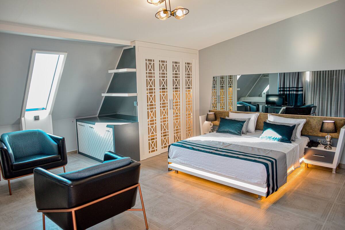 Chambre Double Deluxe | Literie de qualité supérieure, matelas Select Comfort, minibar