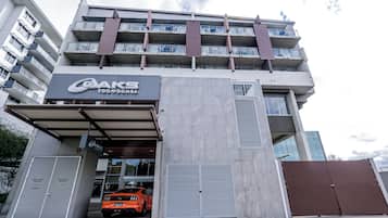 A multi-story building with a prominent sign for 'Baks Toowoomba' on the ground floor.