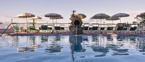 Indoor pool, seasonal outdoor pool, pool umbrellas, sun loungers