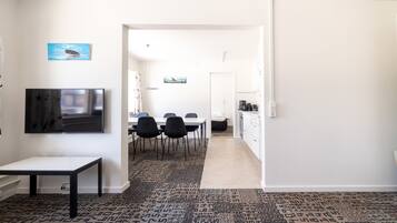 Apartment, 1 Bedroom (108) | Living area | Flat-screen TV