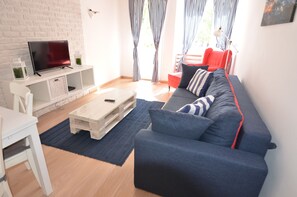 Apartamento | Sala de estar | TV de tela plana