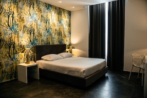 客房 | 高档床上用品、羽绒被、记忆海绵床垫、迷你吧