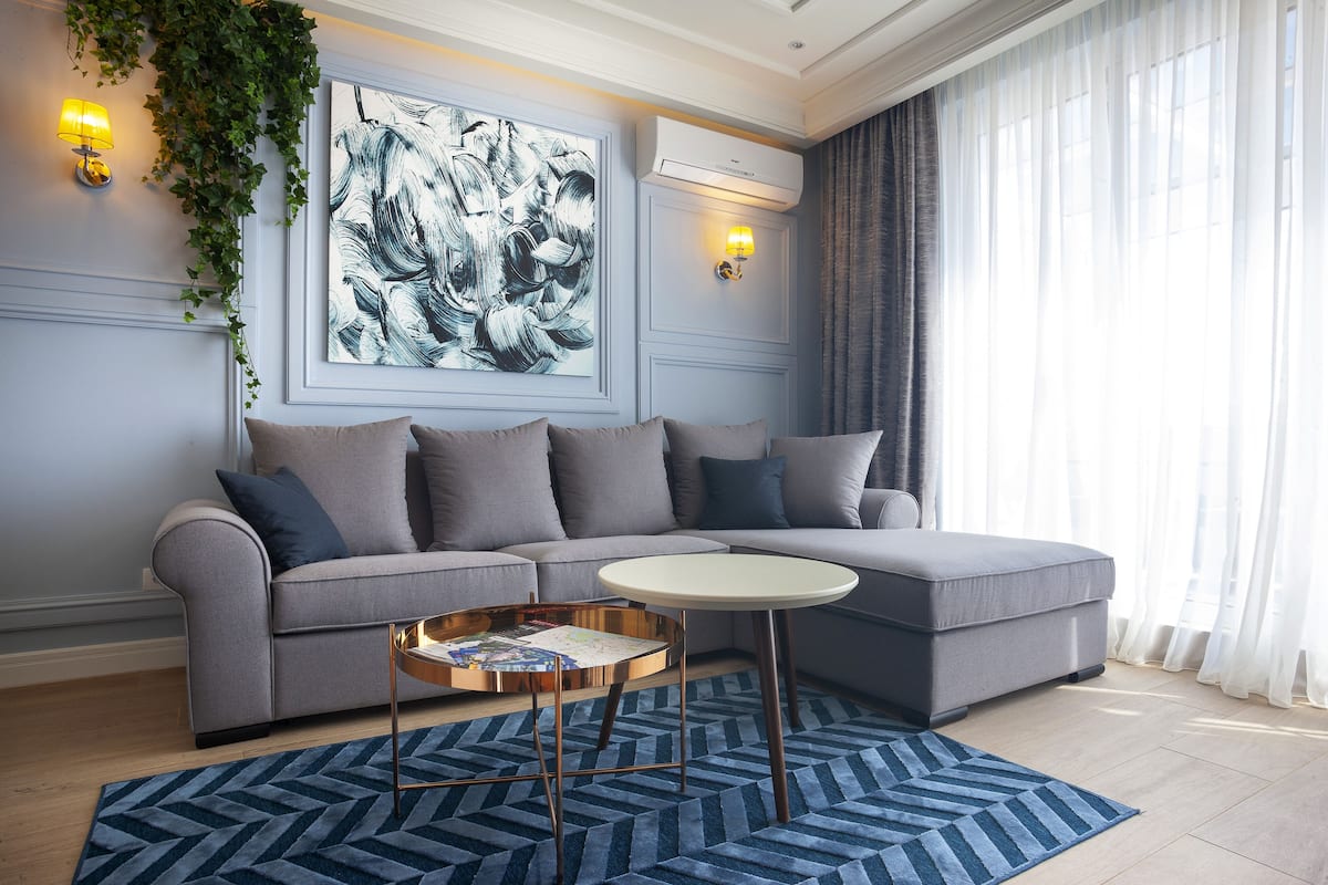 Exclusive Apartment | Living area | 32-inch flat-screen TV with cable channels, TV