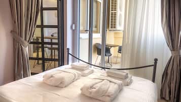 Superior Apartment | Living area | 32-inch flat-screen TV with cable channels, TV