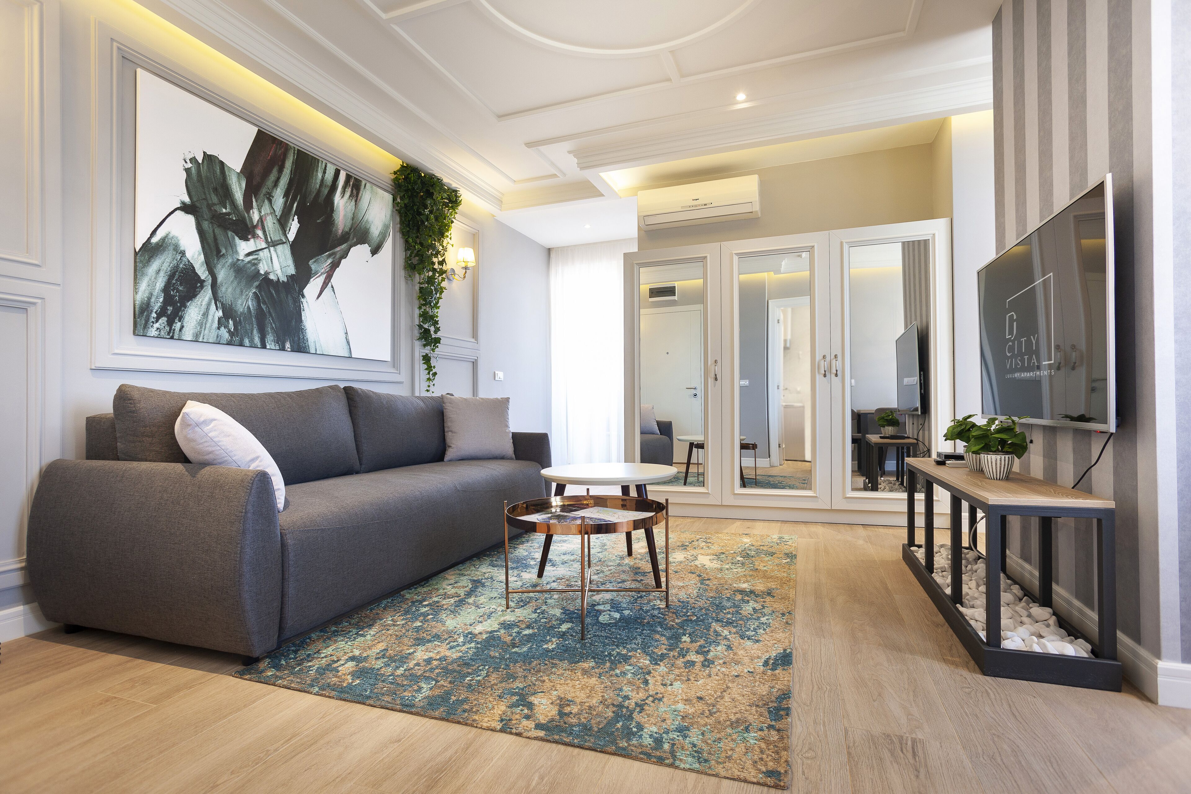 Comfort Apartment | Living area | 32-inch flat-screen TV with cable channels, TV