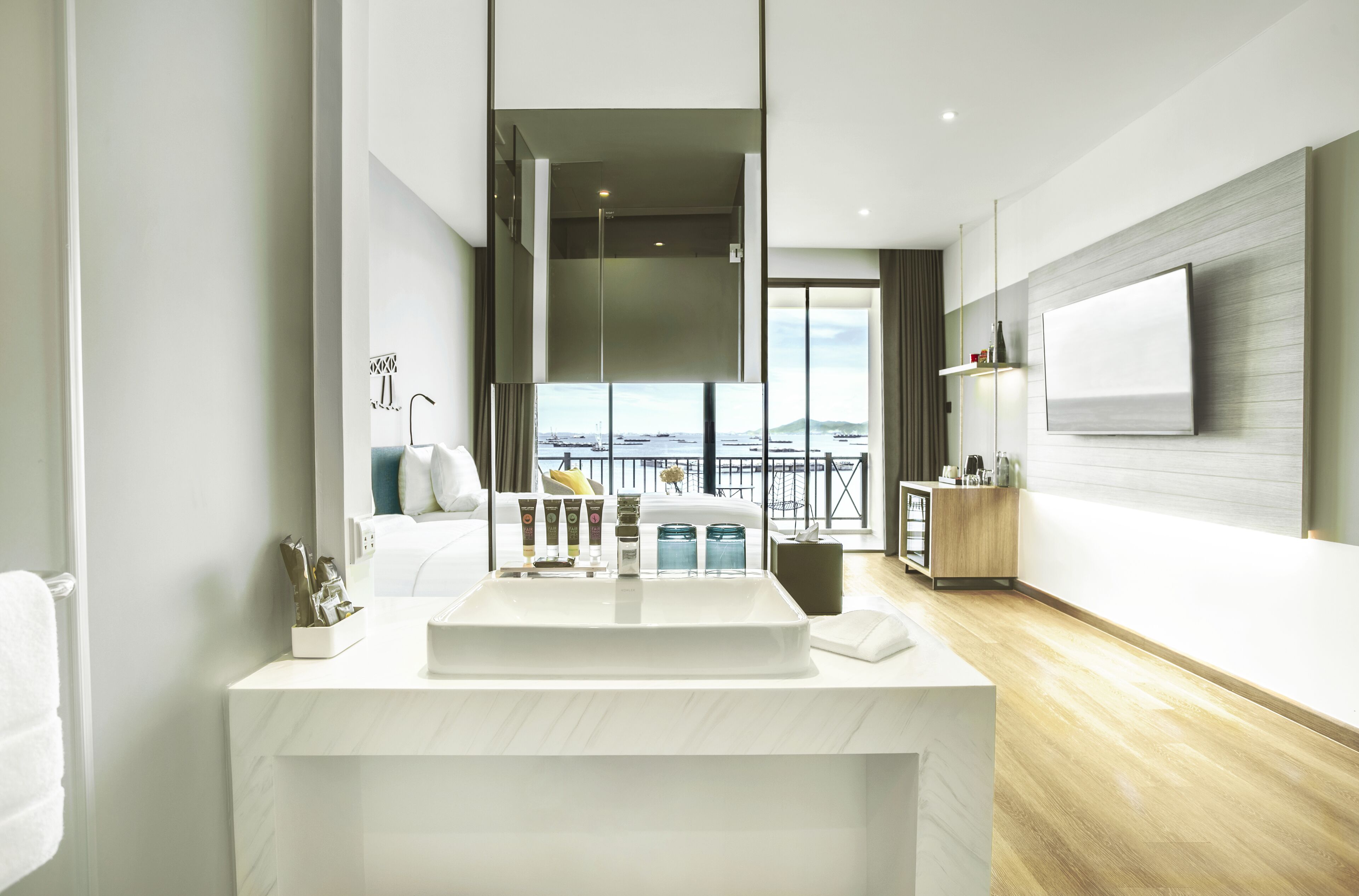 deluxe room, 2 single beds, sea view (koh si chang marina) | bathroom | eco-friendly toiletries, hair dryer, bathrobes, slippers