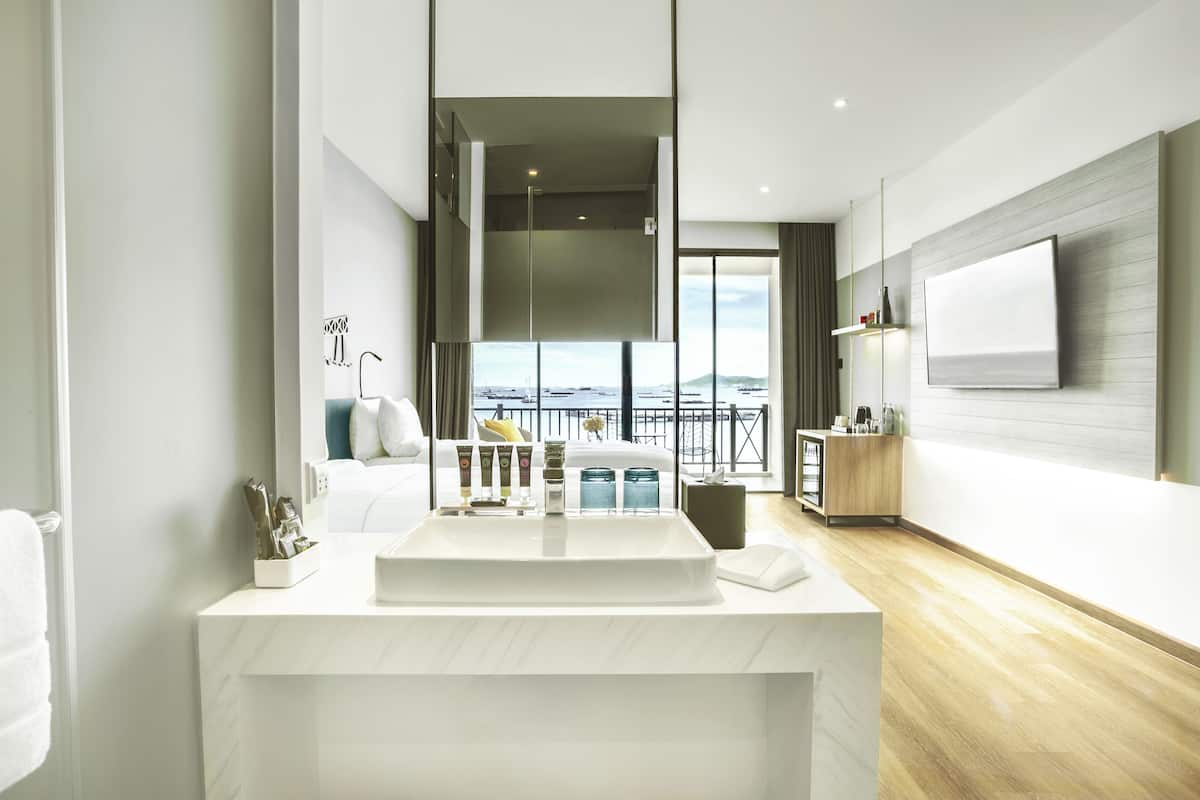 deluxe room, 2 single beds, sea view (koh si chang marina) | bathroom | eco-friendly toiletries, hair dryer, bathrobes, slippers