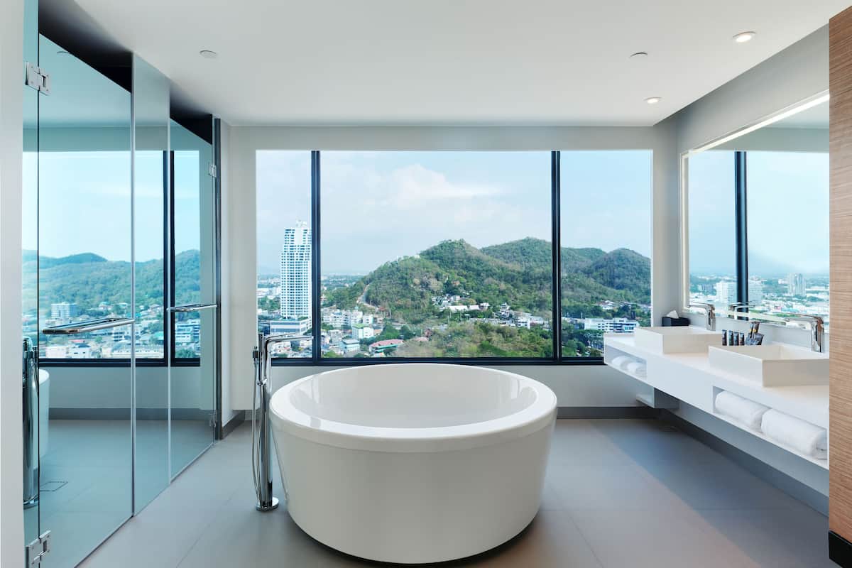 eco-friendly toiletries, hair dryer, bathrobes, slippers