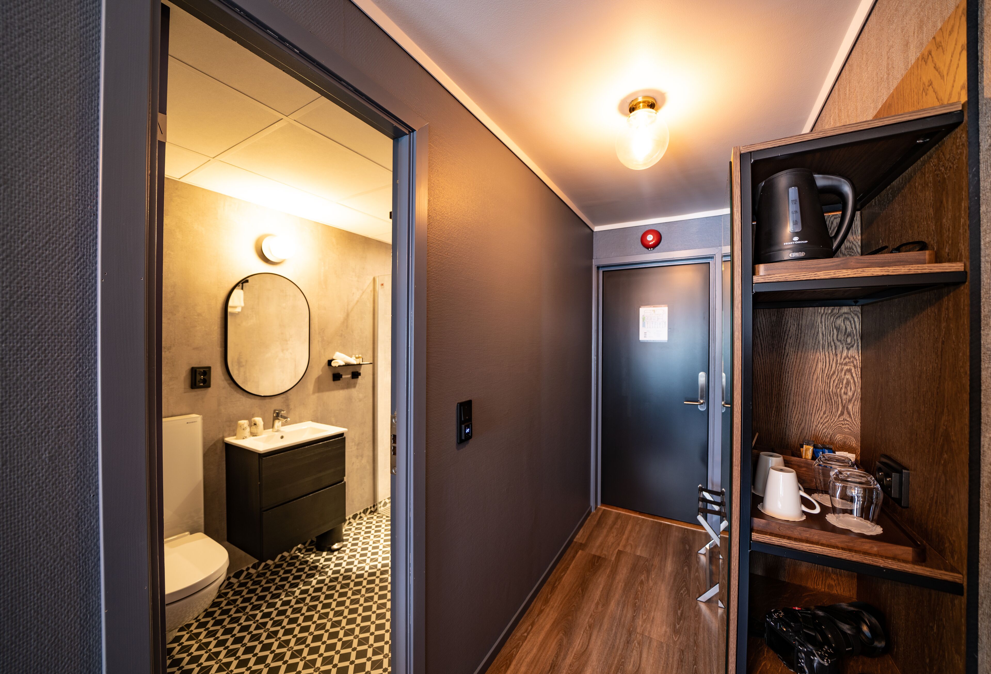 deluxe quadruple room | bathroom | hair dryer, towels