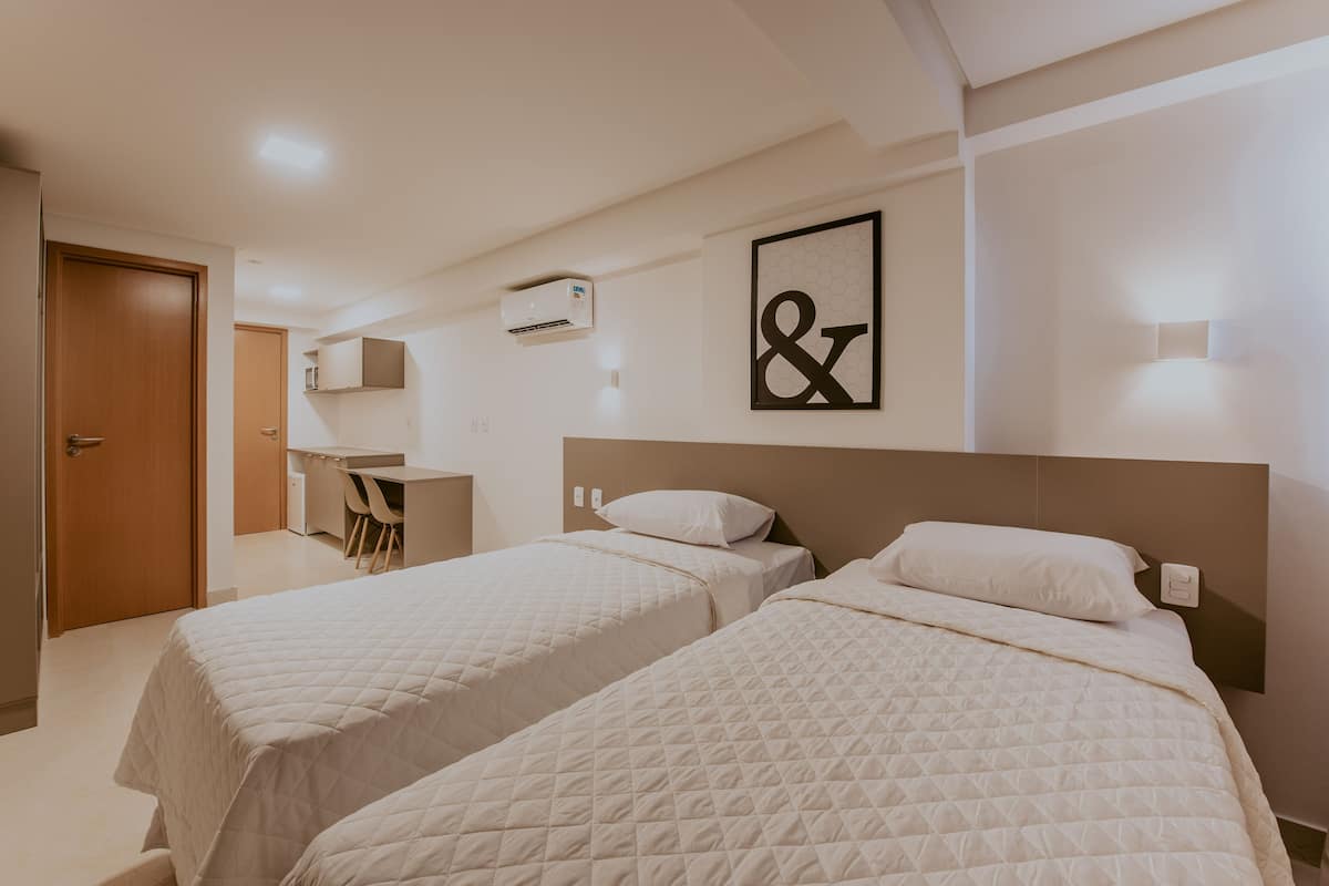 standard single room | individually furnished, desk, laptop workspace, blackout curtains