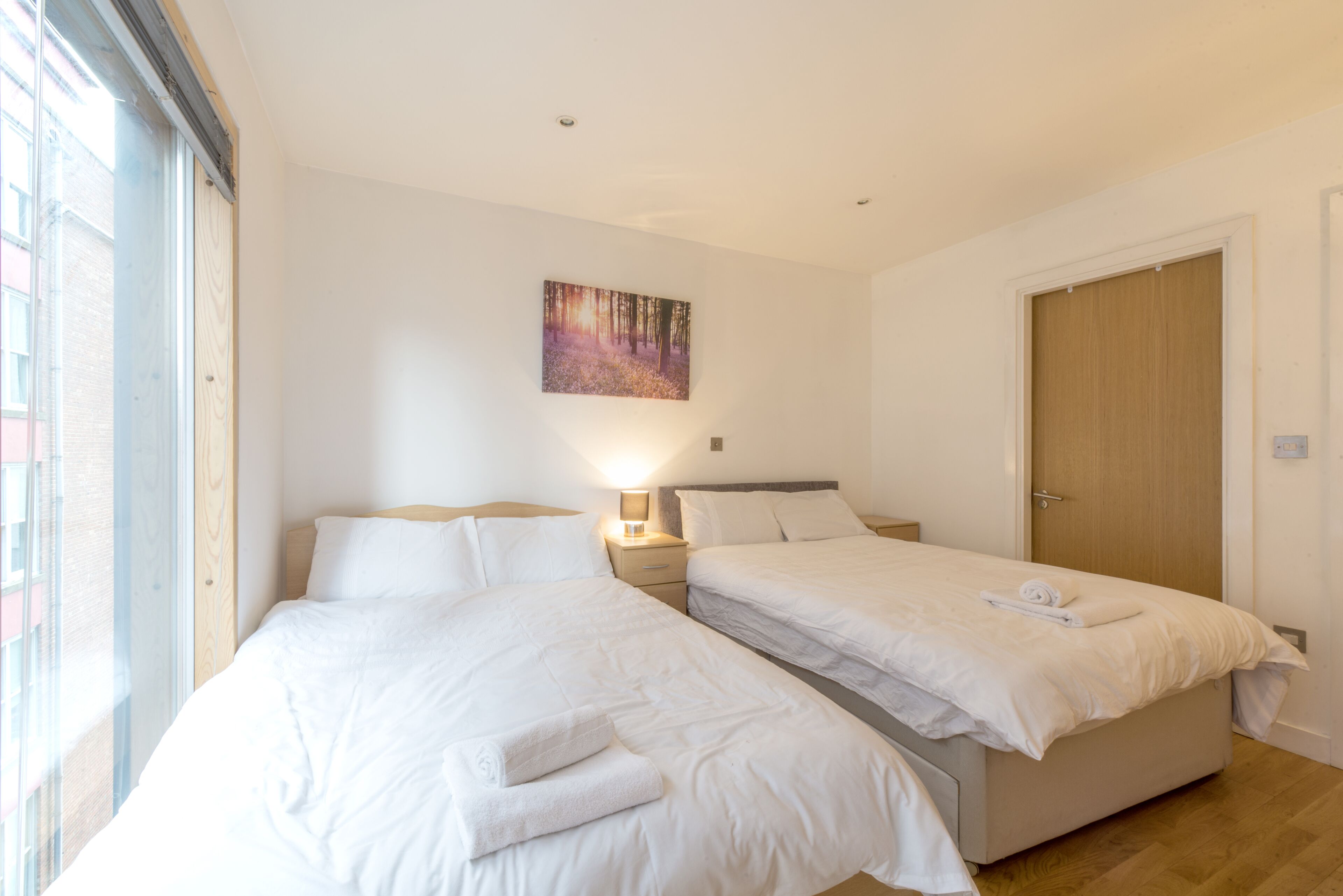 Three-Bedroom Apartment | Iron/ironing board, free WiFi