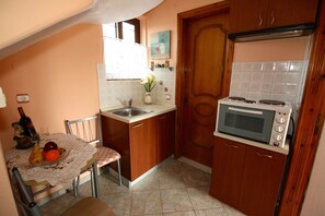Apartment, 2 Bedrooms | Private kitchenette | Fridge, oven, stovetop, toaster oven