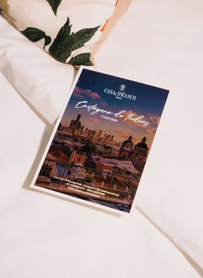 A brochure for Casa Franco Hotel in Cartagena, Colombia, featuring a cityscape view. - Casa Franco Hotel (Cartagena)