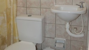 Shower, towels, toilet paper