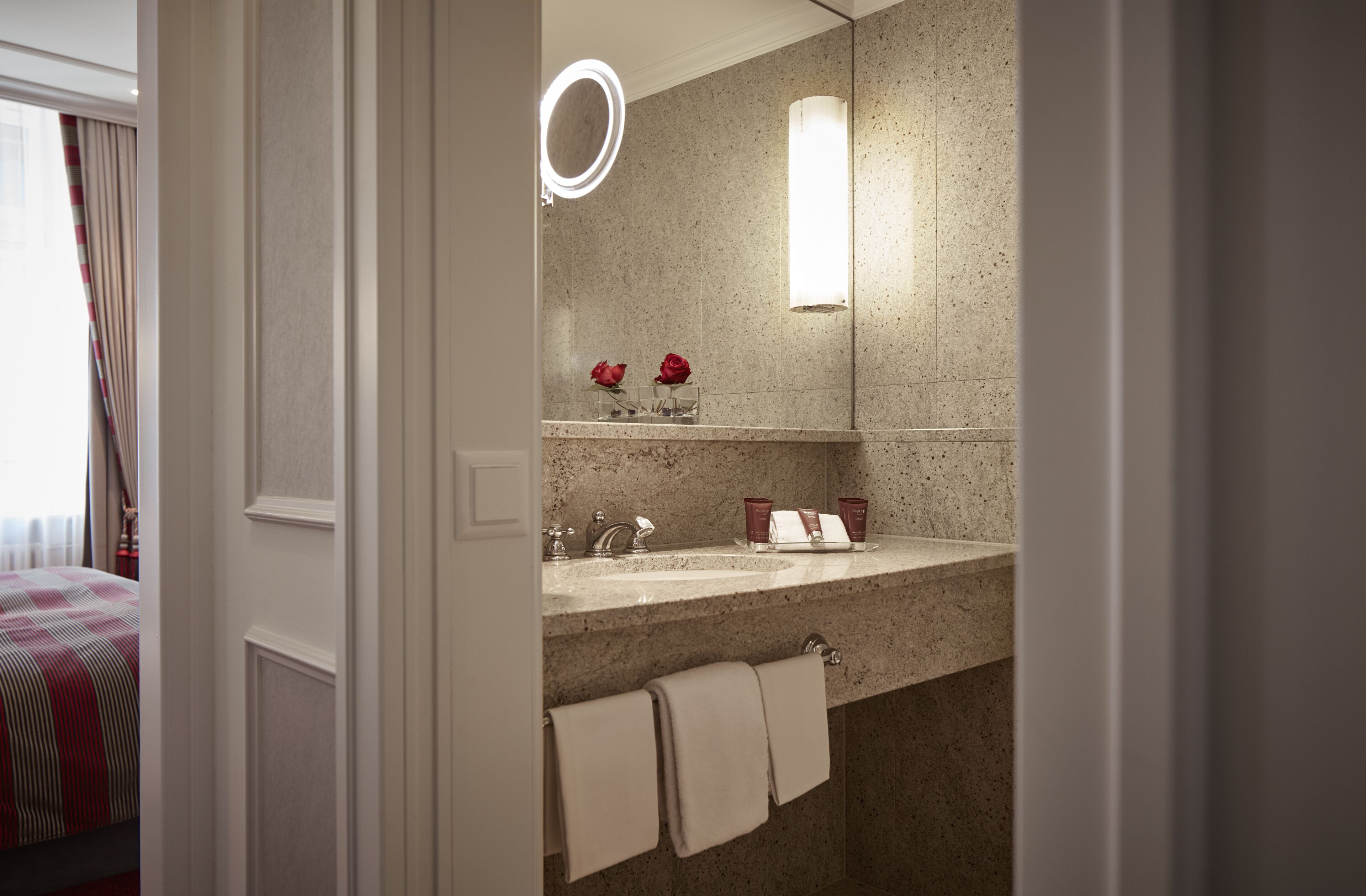junior suite | bathroom | designer toiletries, hair dryer, bathrobes, slippers