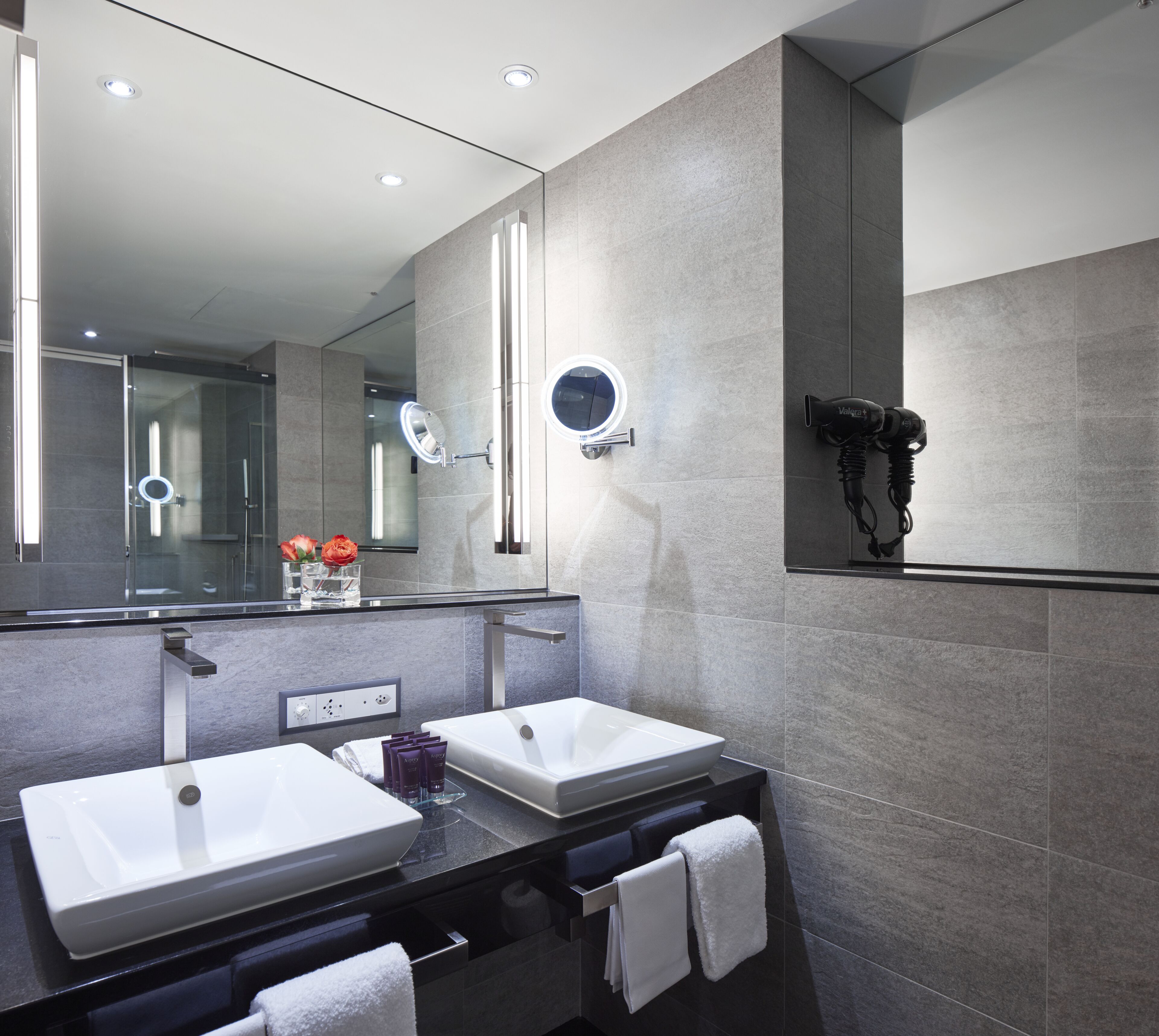deluxe double room | bathroom | designer toiletries, hair dryer, bathrobes, slippers