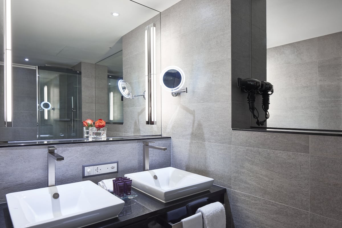 deluxe double room | bathroom | designer toiletries, hair dryer, bathrobes, slippers