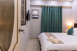 1 habitación, tabla de planchar con plancha, wifi y ropa de cama 
