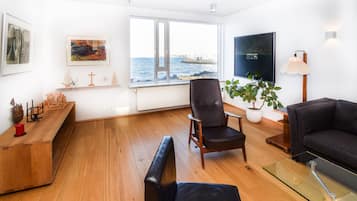 Leilighet – deluxe | Oppholdsområde | Plasma-TV