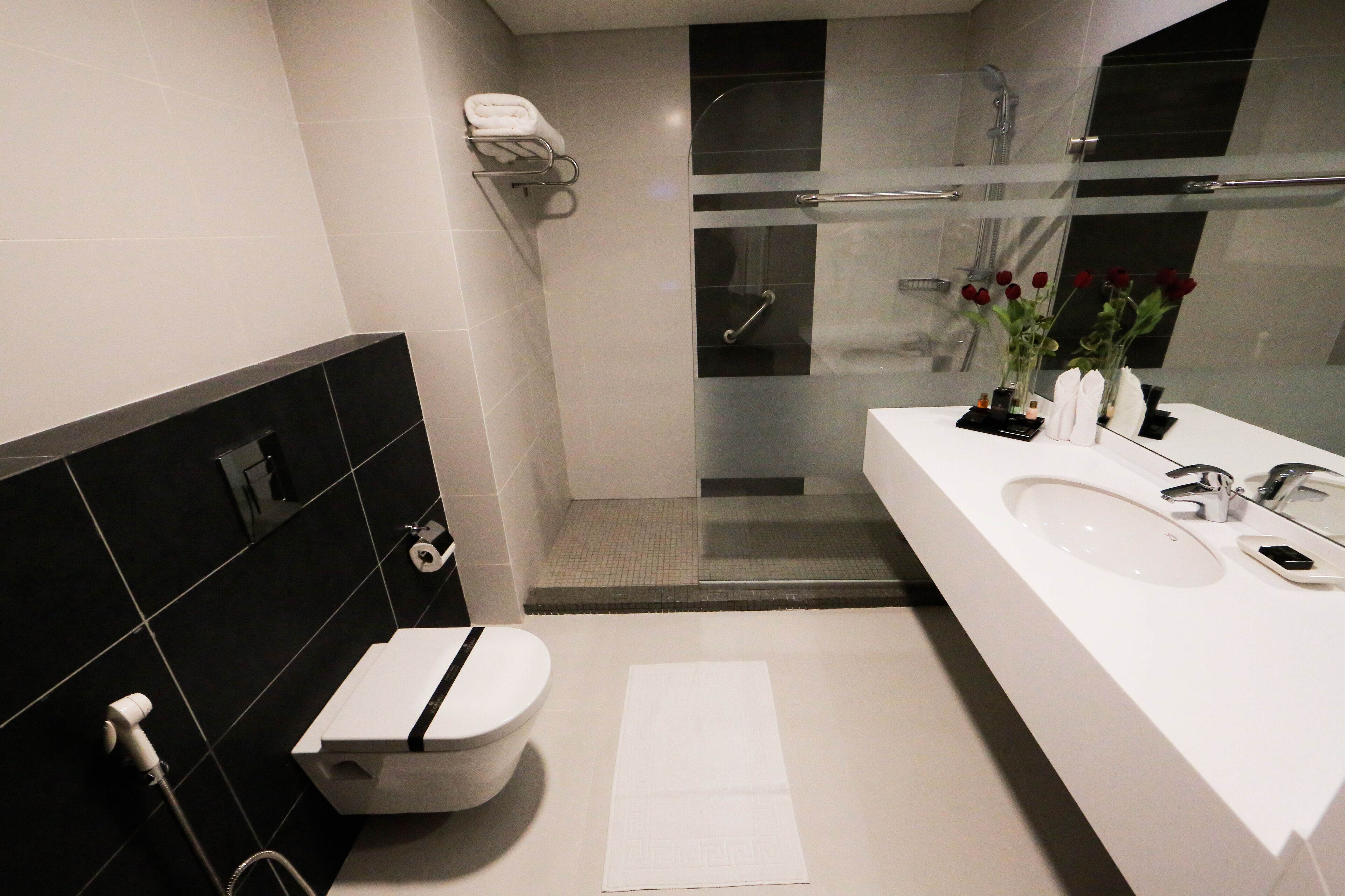 junior suite | bathroom | shower, rainfall showerhead, free toiletries, hair dryer