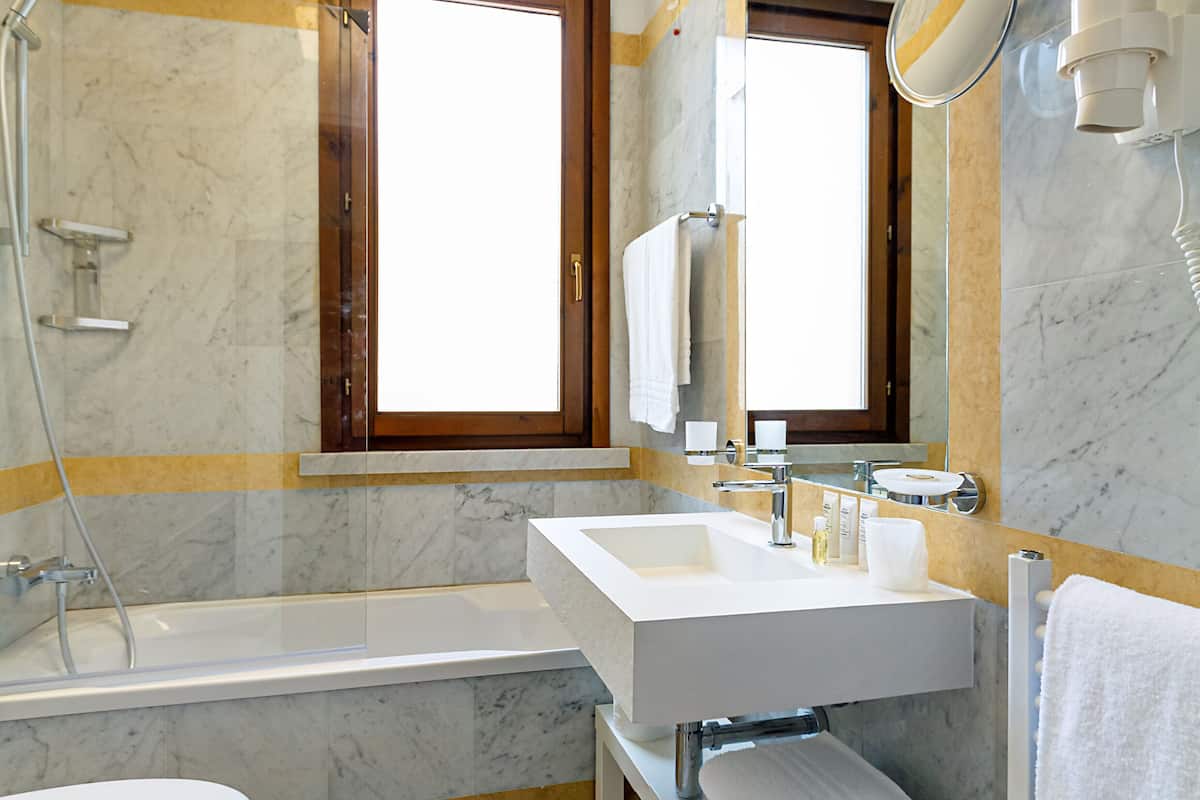 superior double or twin room | bathroom | shower, rainfall showerhead, designer toiletries, hair dryer