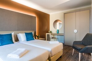 Deluxe Quadruple Room | Down comforters, pillowtop beds, minibar, in-room safe - SEAWATER HOTEL BIO & BEAUTY SPA  (Marsala)