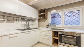 Appartement, 2 chambres | Cuisine privée | Grand réfrigérateur, four, plaque de cuisson, lave-vaisselle