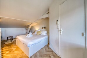 1 habitación, tabla de planchar con plancha, wifi gratis y ropa de cama 