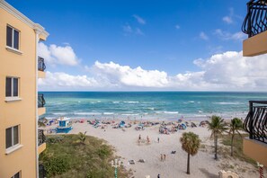 On the beach, sun-loungers, beach towels