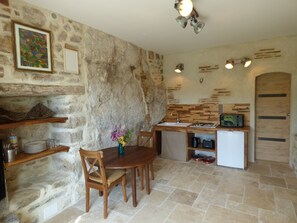 Fridge, microwave, stovetop, coffee/tea maker