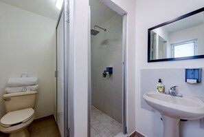 Superior Quadruple Room | Bathroom | Shower, rainfall showerhead, towels, soap