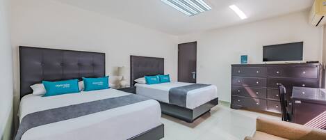 Kamar Quadruple Superior | Seprai antialergi dan didekorasi berbeda-beda